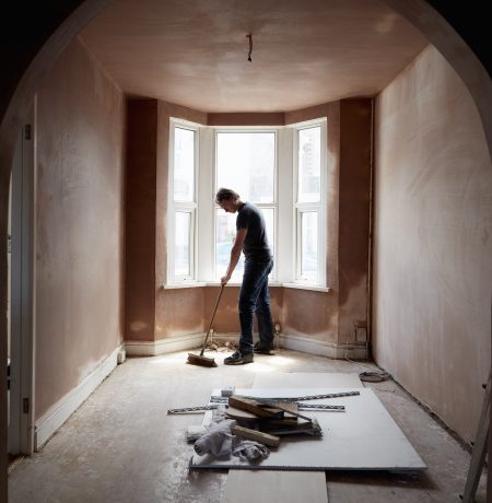 Modern custom-built home with a stylish exterior, large glass windows, and clean architectural lines by Prime Built.